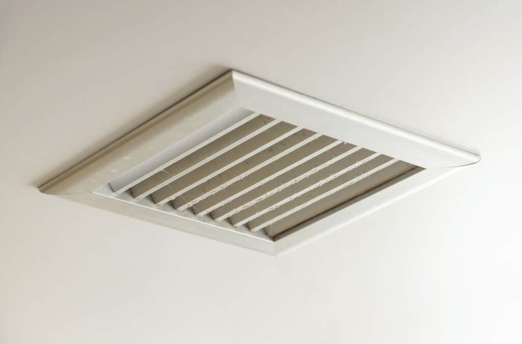 Residential air duct inspected for dust buildup and airflow issues